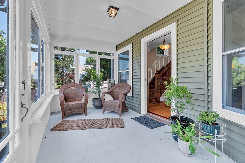 138 Webster Street Needham, MA 02494 - Photo 15 of 29 a balcony with furniture and a potted plant