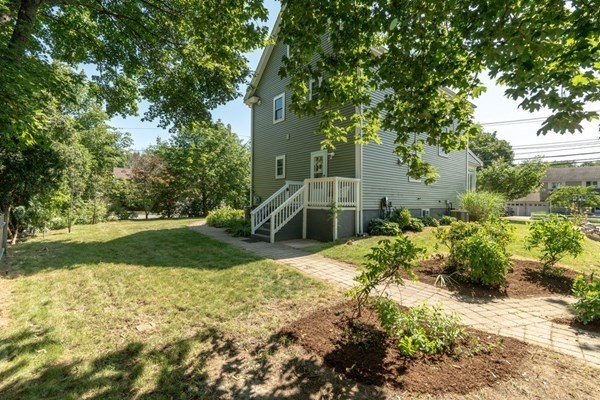 138 Webster Street Needham, MA 02494 - Photo 28 of 29 a front view of a house with a yard