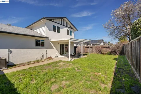 a view of yard with patio
