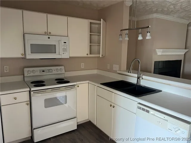 a view of a bathroom with wooden floor