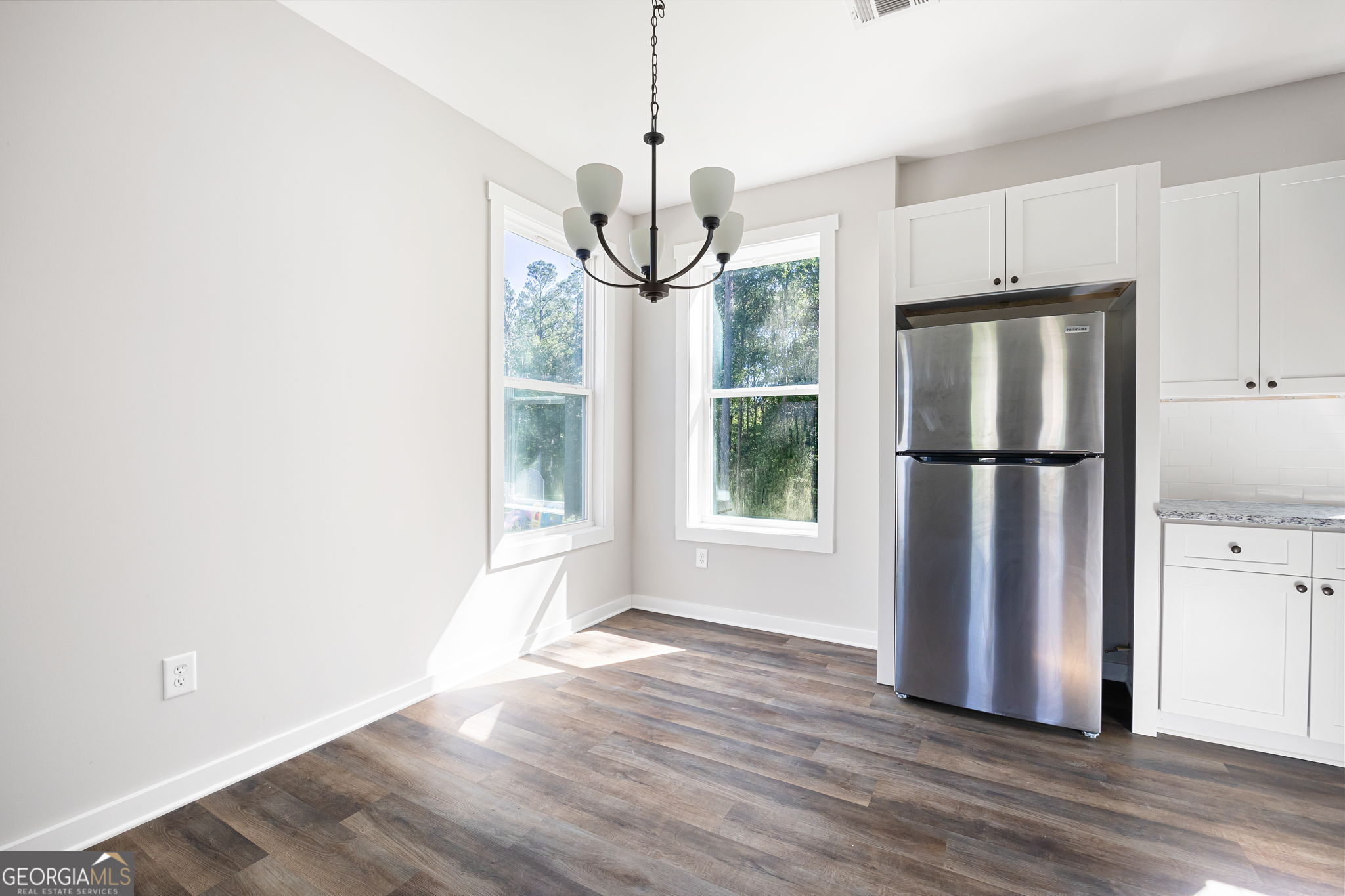 205 Pinecrest Road Cedartown, GA 30125 - Photo 11 of 27 a view of kitchen with stainless steel appliances granite countertop cabinets and wooden floor