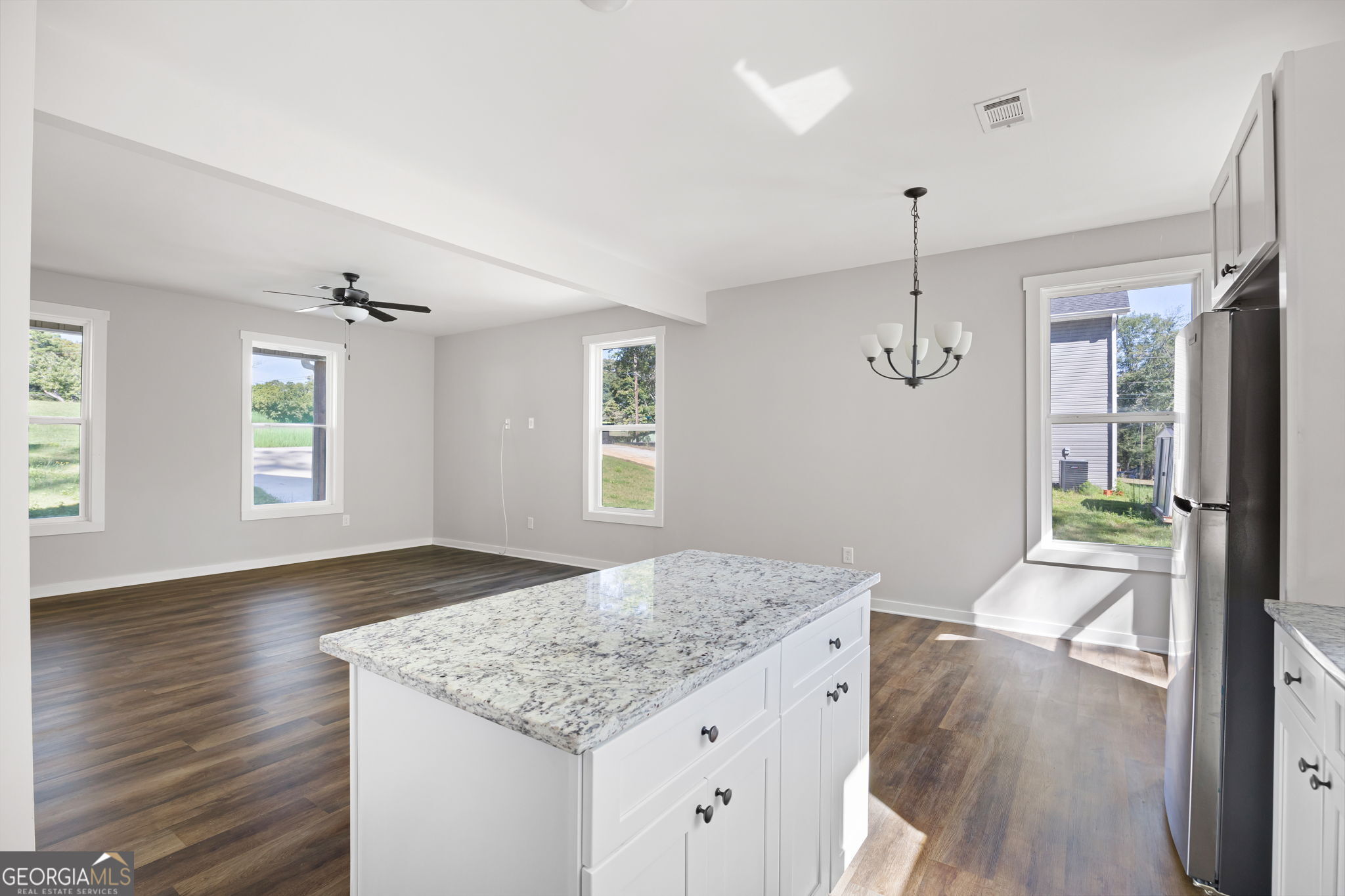 205 Pinecrest Road Cedartown, GA 30125 - Photo 15 of 27 a view of kitchen and hall with wooden floor