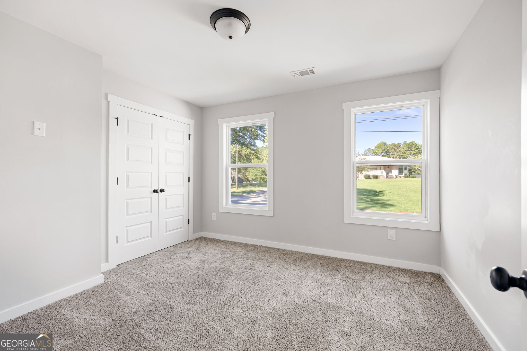 205 Pinecrest Road Cedartown, GA 30125 - Photo 21 of 27 an empty room with windows