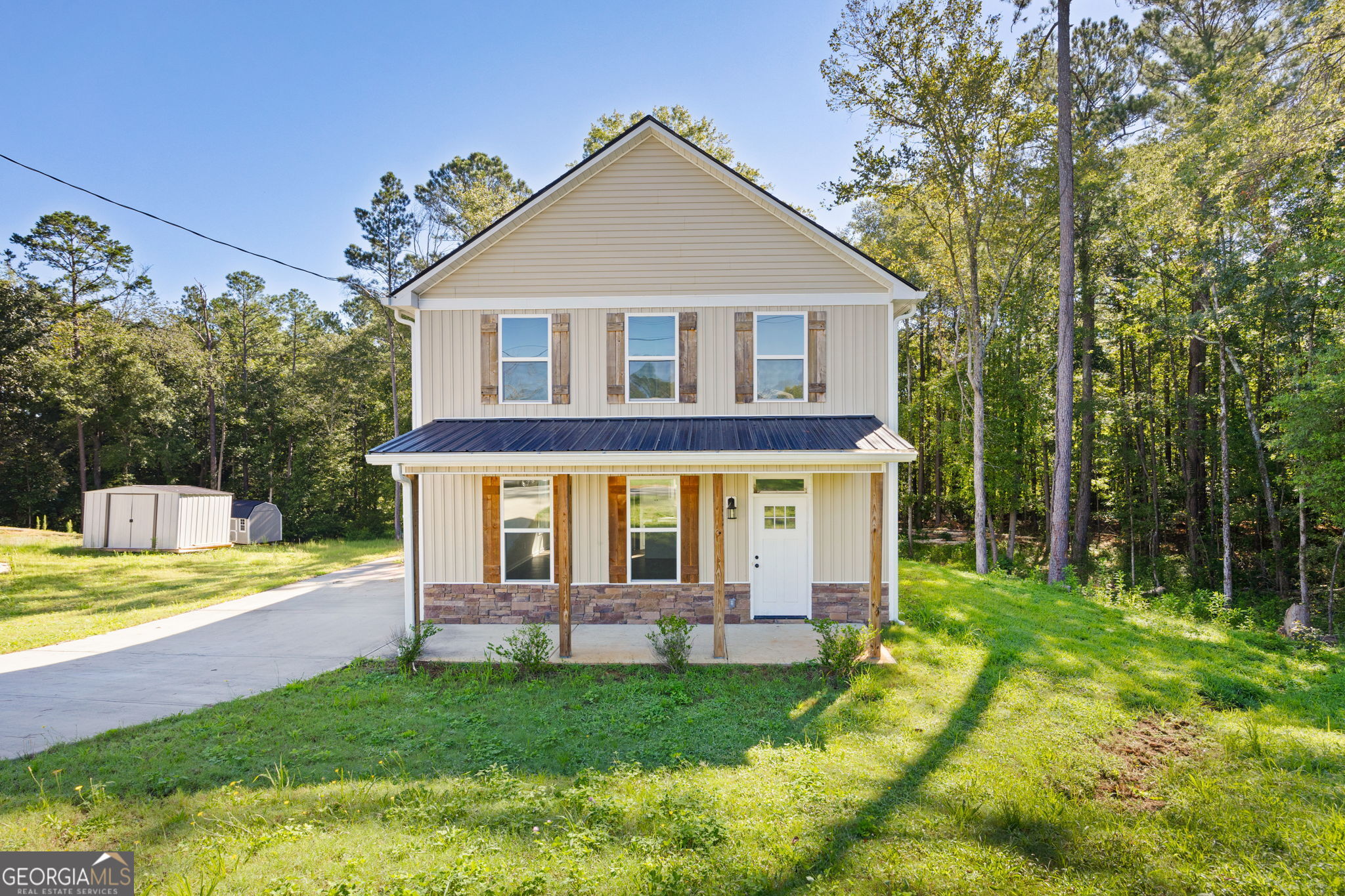 205 Pinecrest Road Cedartown, GA 30125 - Photo 3 of 27 a view of a house with a yard porch and sitting area