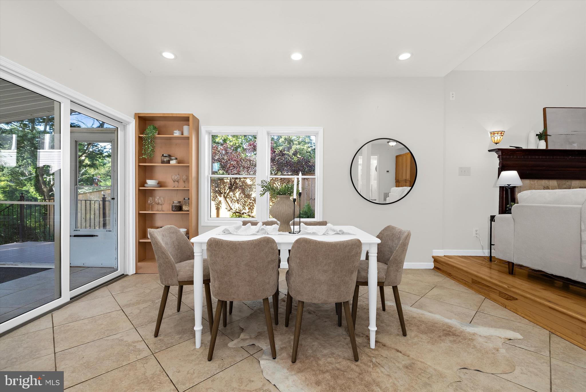 619 Riverside Drive Pasadena, MD 21122 - Photo 20 of 84 a dining room with furniture and a mirror