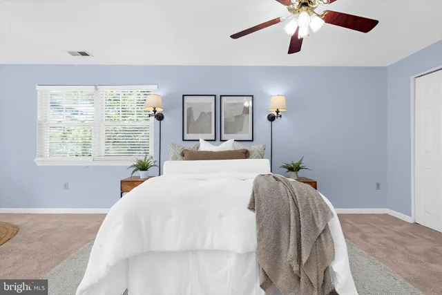 an aerial view of residential house with outdoor space and swimming pool