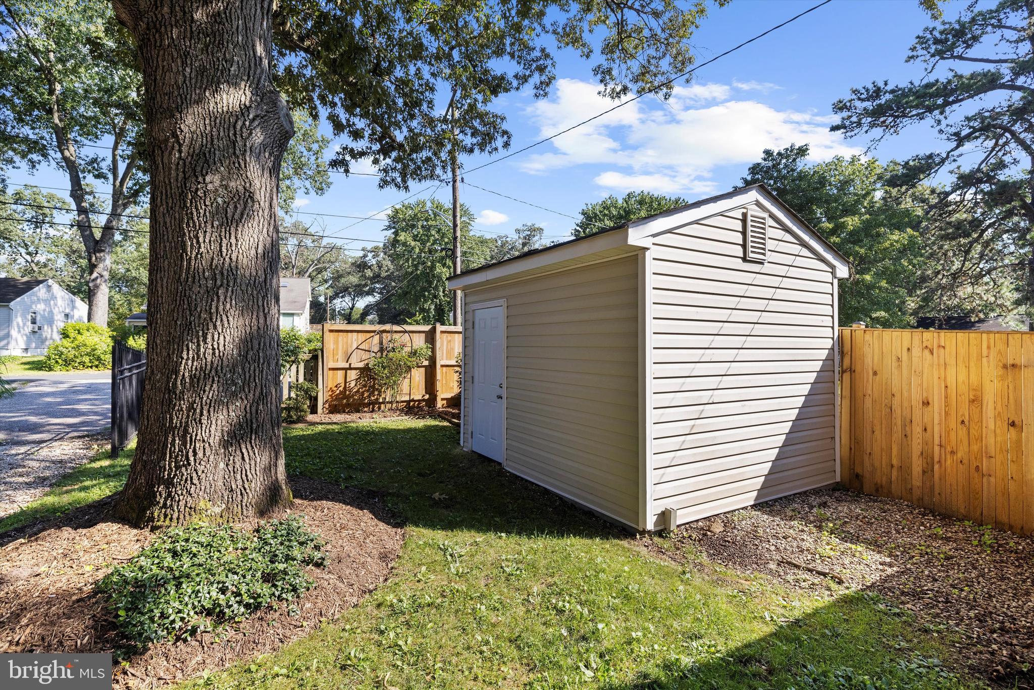 619 Riverside Drive Pasadena, MD 21122 - Photo 62 of 84 a view of a back yard of the house