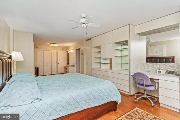 a view of a bedroom with furniture and entryway