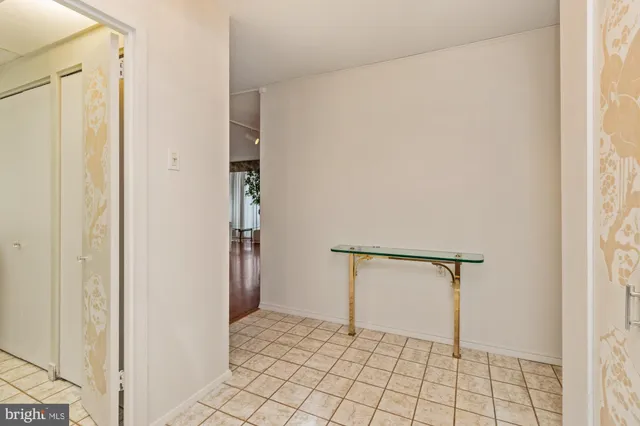 a view of entryway with wooden floor