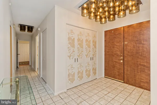 an empty room with mirror