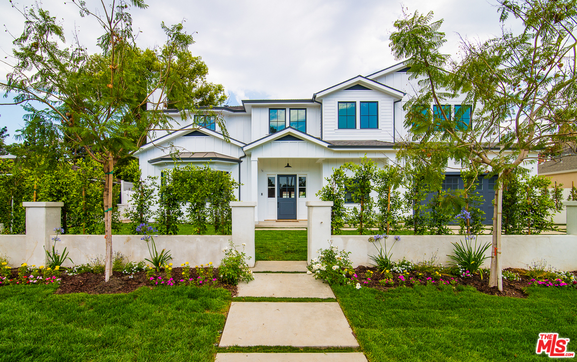 4425 Beck Avenue Studio City, CA 91602 - Photo 2 of 48 a front view of a house with a garden and plants