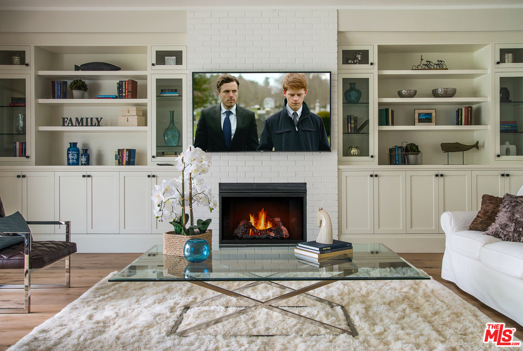 4425 Beck Avenue Studio City, CA 91602 - Photo 16 of 48 a living room with furniture and a fireplace