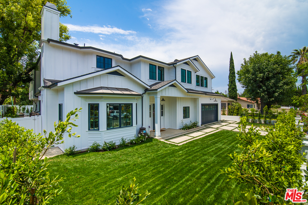4425 Beck Avenue Studio City, CA 91602 - Photo 3 of 48 a front view of a house with a yard and porch