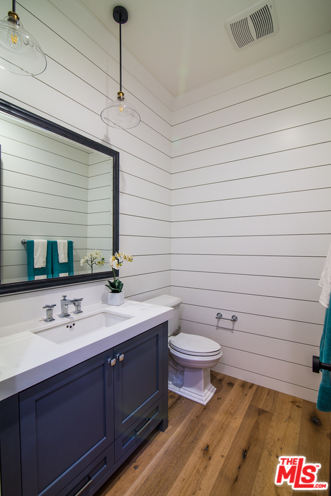 4425 Beck Avenue Studio City, CA 91602 - Photo 22 of 48 a bathroom with a toilet sink and mirror