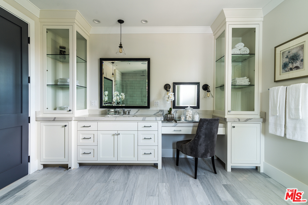 4425 Beck Avenue Studio City, CA 91602 - Photo 32 of 48 a spacious bathroom with a double vanity sink and a mirror