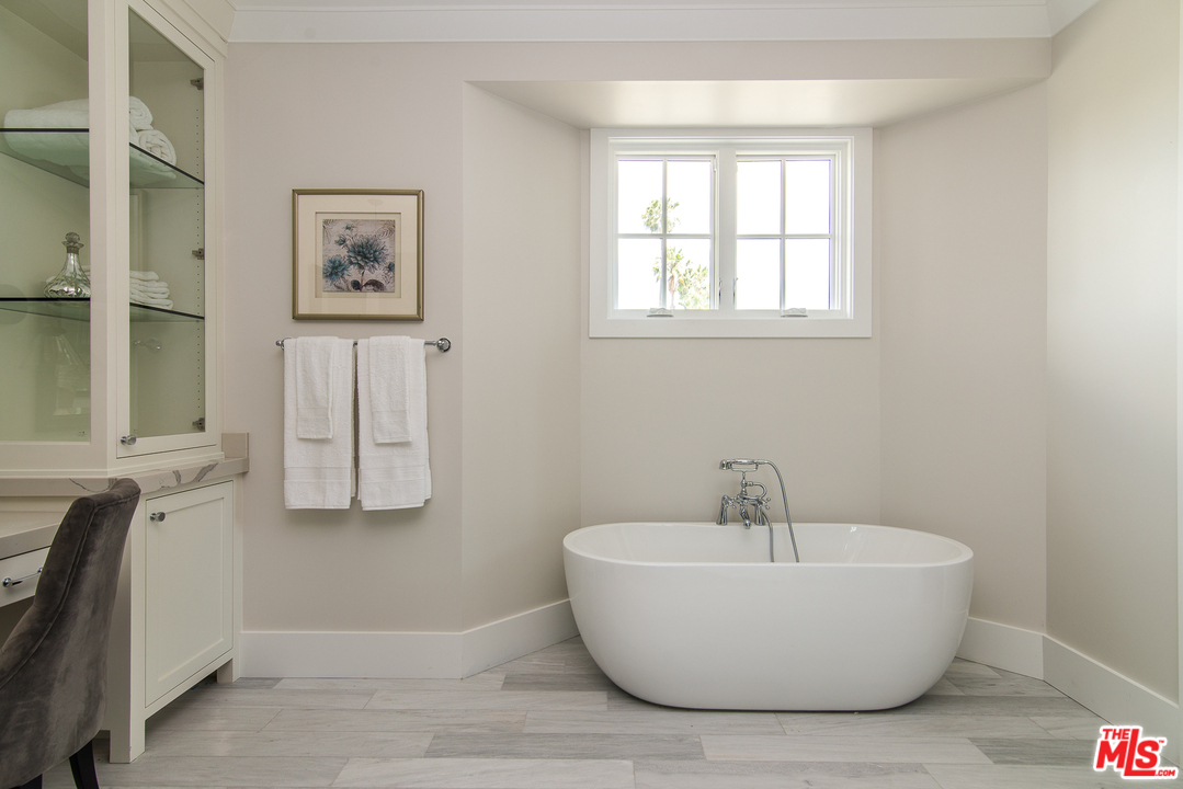4425 Beck Avenue Studio City, CA 91602 - Photo 33 of 48 a white bath tub sitting next to a bathroom sink