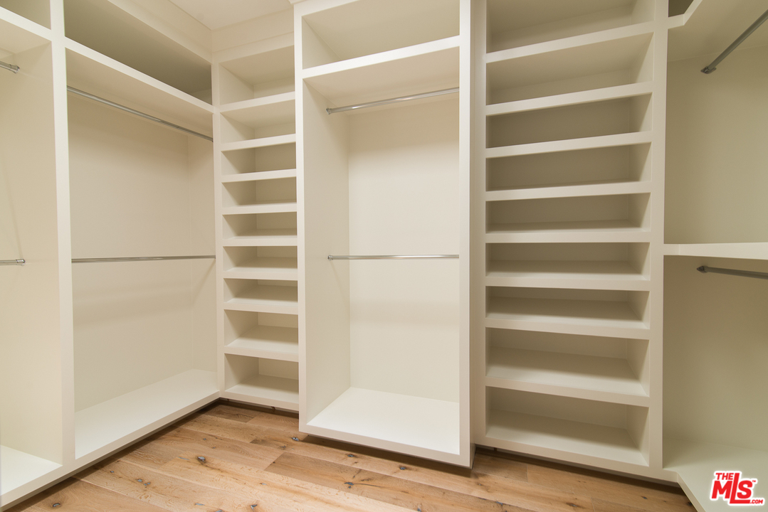4425 Beck Avenue Studio City, CA 91602 - Photo 34 of 48 a view of walk in closet with empty racks
