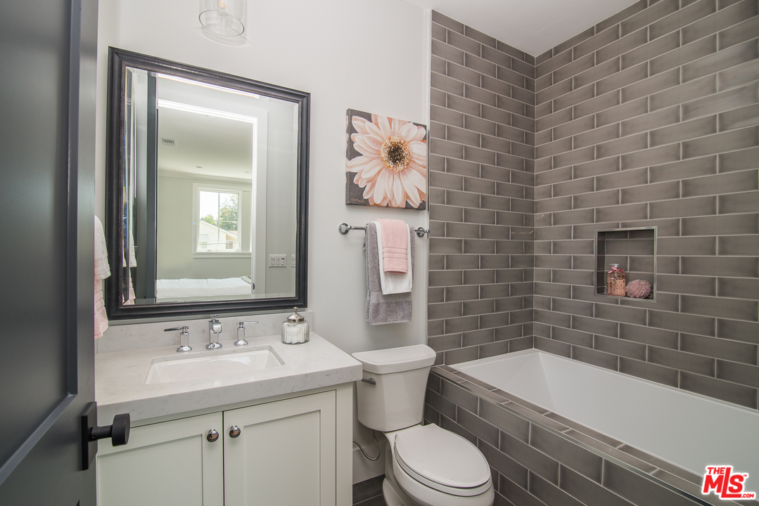 4425 Beck Avenue Studio City, CA 91602 - Photo 38 of 48 a bathroom with a sink a toilet and bathtub