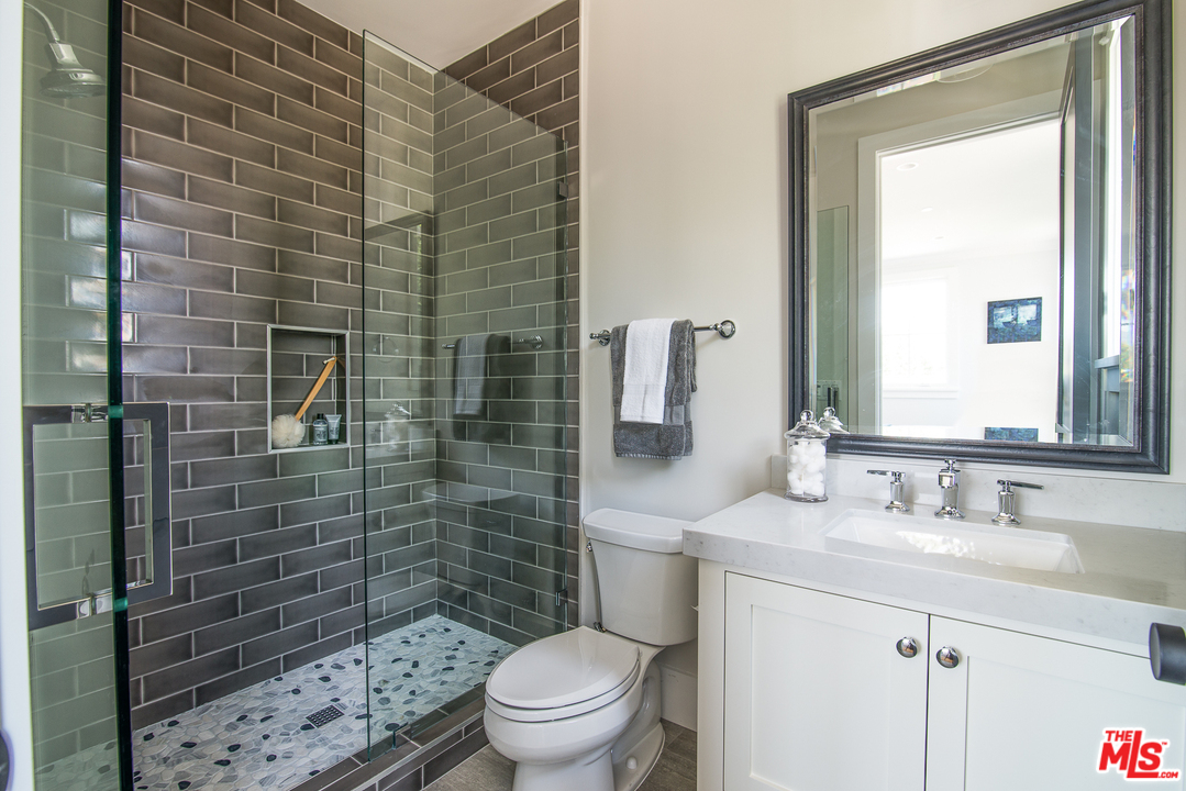 4425 Beck Avenue Studio City, CA 91602 - Photo 40 of 48 a bathroom with a sink a toilet and shower