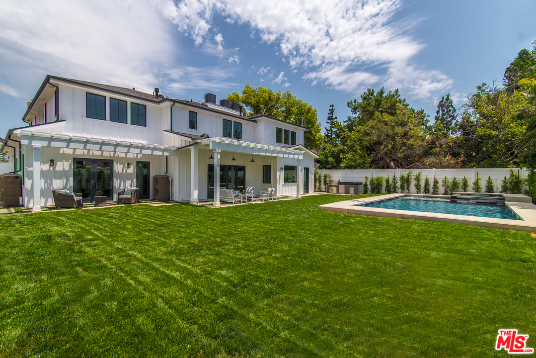 4425 Beck Avenue Studio City, CA 91602 - Photo 42 of 48 a view of an house with backyard and a garden