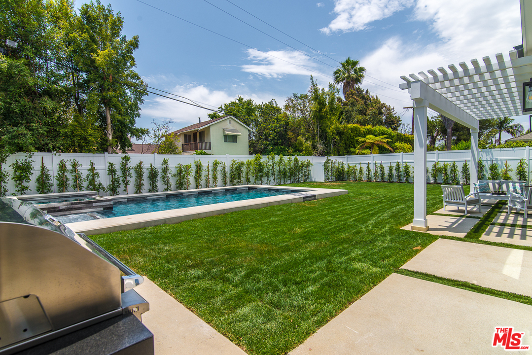 4425 Beck Avenue Studio City, CA 91602 - Photo 48 of 48 a view of a swimming pool with a patio