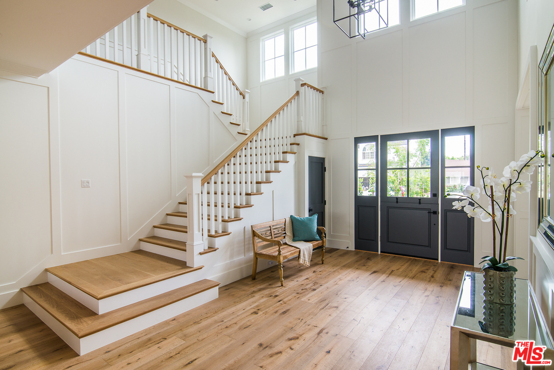 4425 Beck Avenue Studio City, CA 91602 - Photo 6 of 48 a view of an entryway with wooden floor and windows