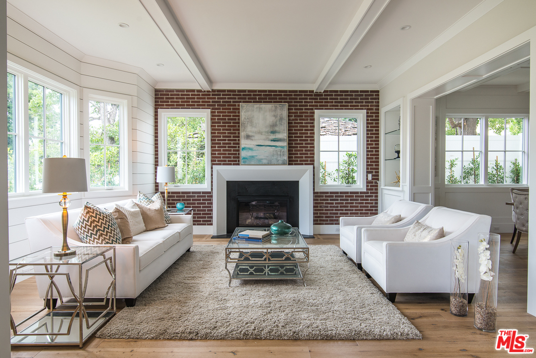 4425 Beck Avenue Studio City, CA 91602 - Photo 8 of 48 a living room with furniture and a fireplace
