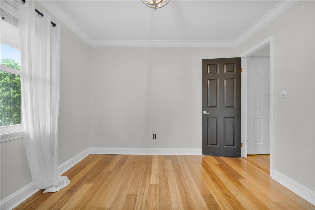 3396 Darien Road Bethlehem, PA 18020 - Photo 24 of 44 Natural light illuminates the rich hardwood flooring in this spacious room.