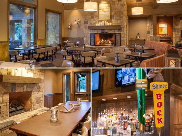 a outdoor dining area with chairs and a fireplace