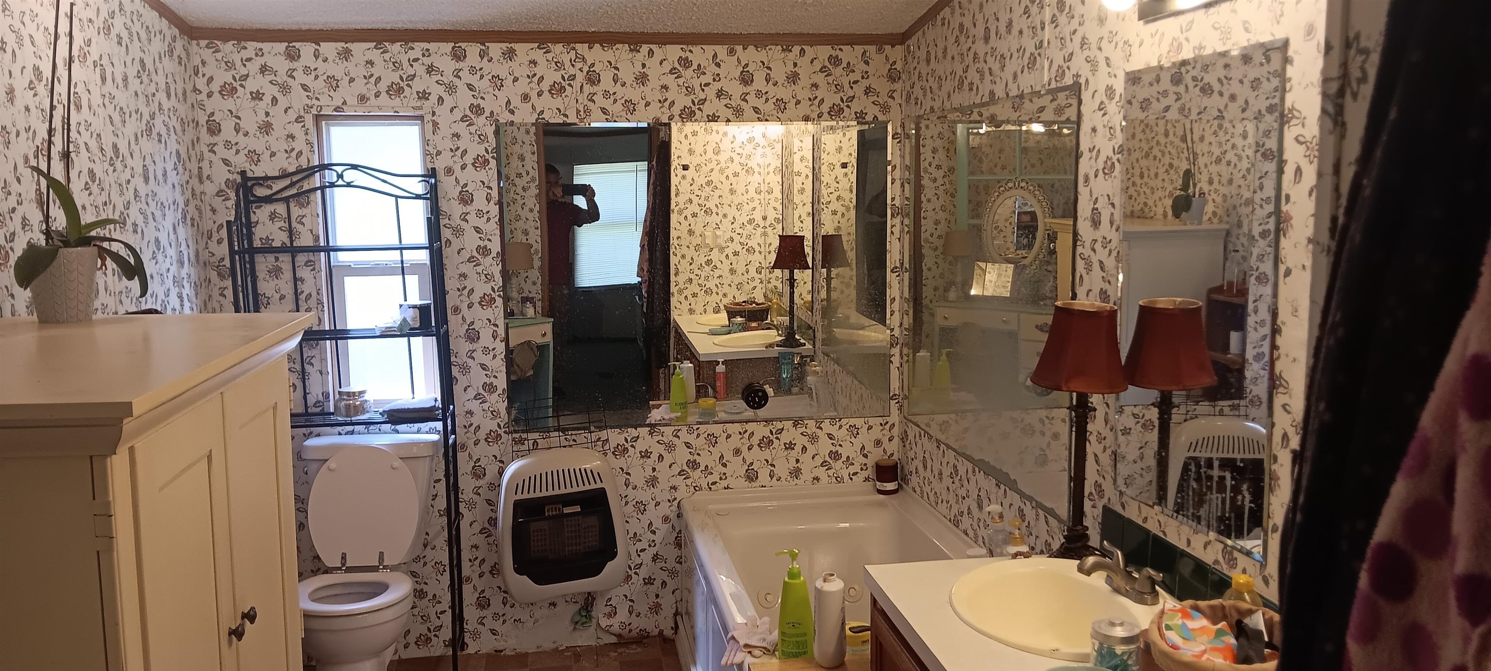 100 Academy Road Pulaski, TN 38478 - Photo 4 of 31 Full bath featuring wallpapered walls, a garden tub, crown molding, heating unit, and vanity