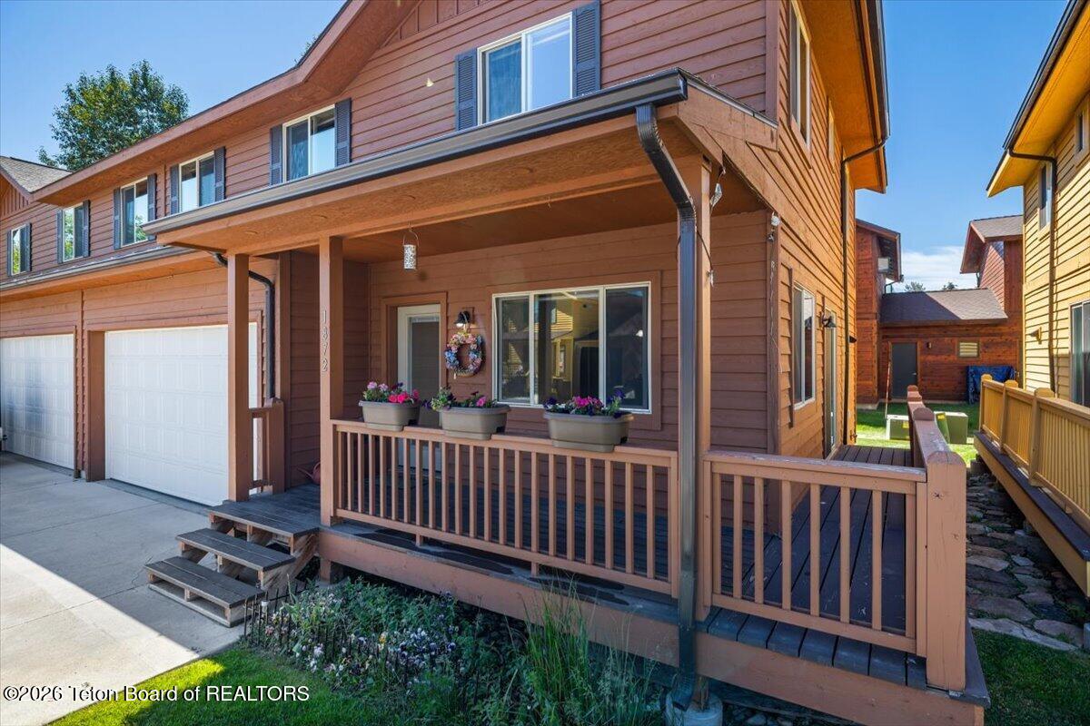 1872 Josephine Loop Jackson, WY 83001 - Photo 3 of 27 Covered Front Porch