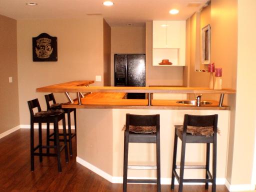 4208 Champion Road Naperville, IL 60564 - Photo 14 of 16 a kitchen with a table and chairs