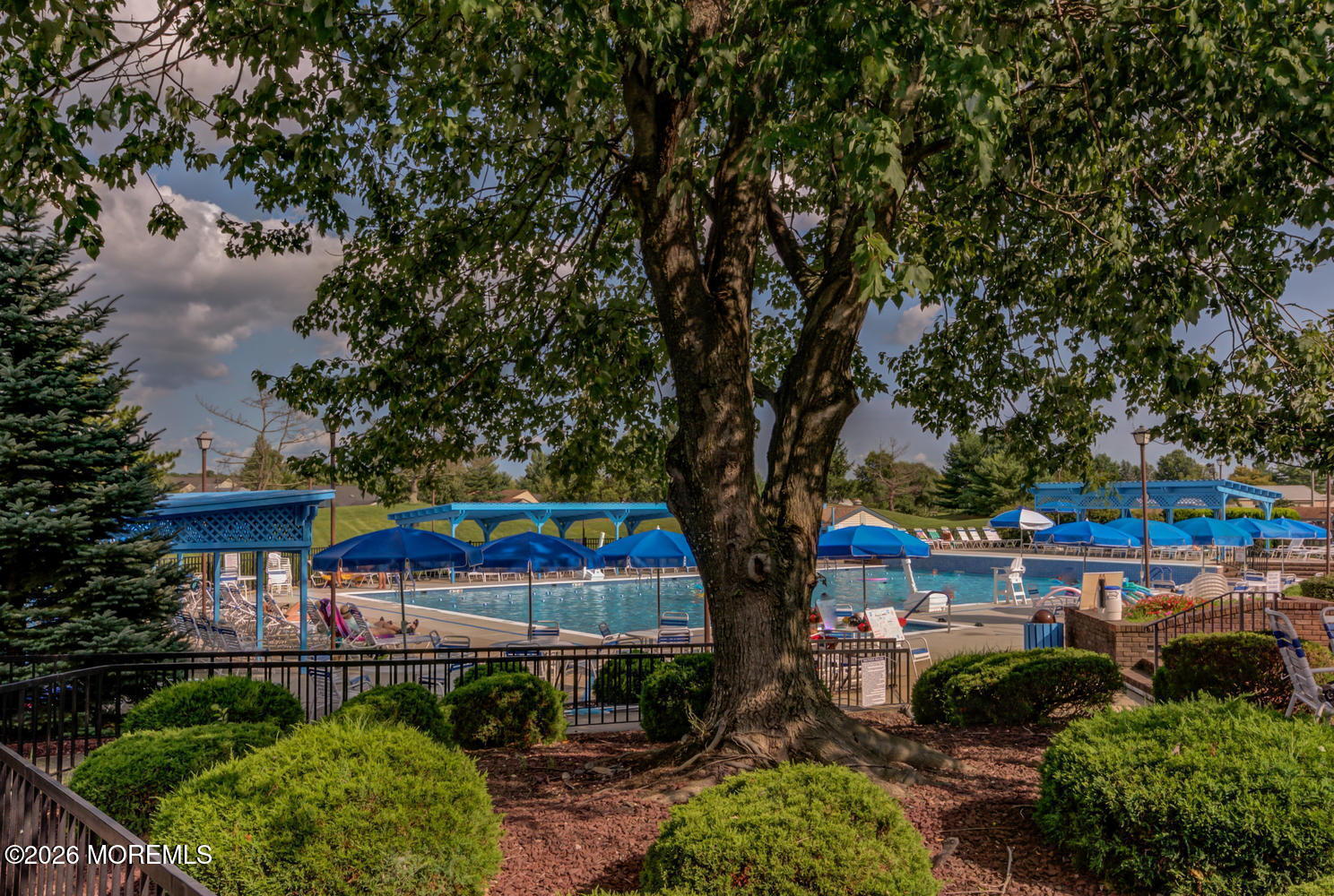 5 Scarborough Road, Unit D Monroe Township, NJ 08831 - Photo 22 of 28 a front view of a house with garden