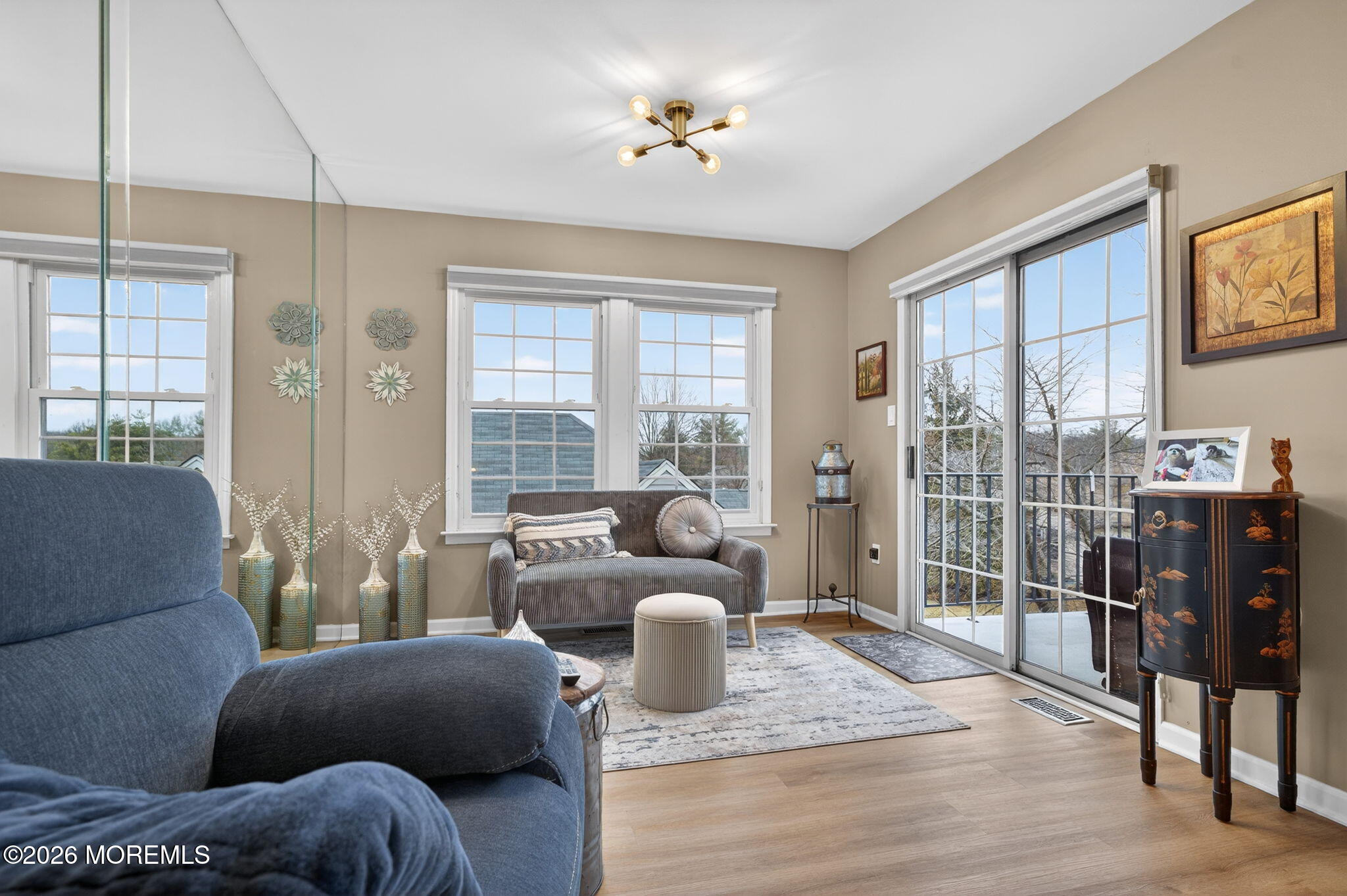 5 Scarborough Road, Unit D Monroe Township, NJ 08831 - Photo 3 of 28 a living room with furniture and wooden floor
