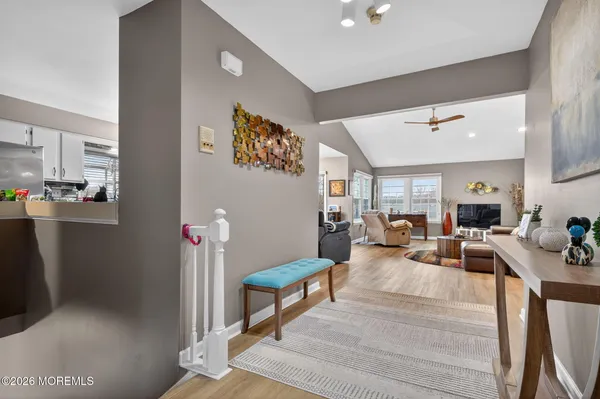 a living room with furniture and a table