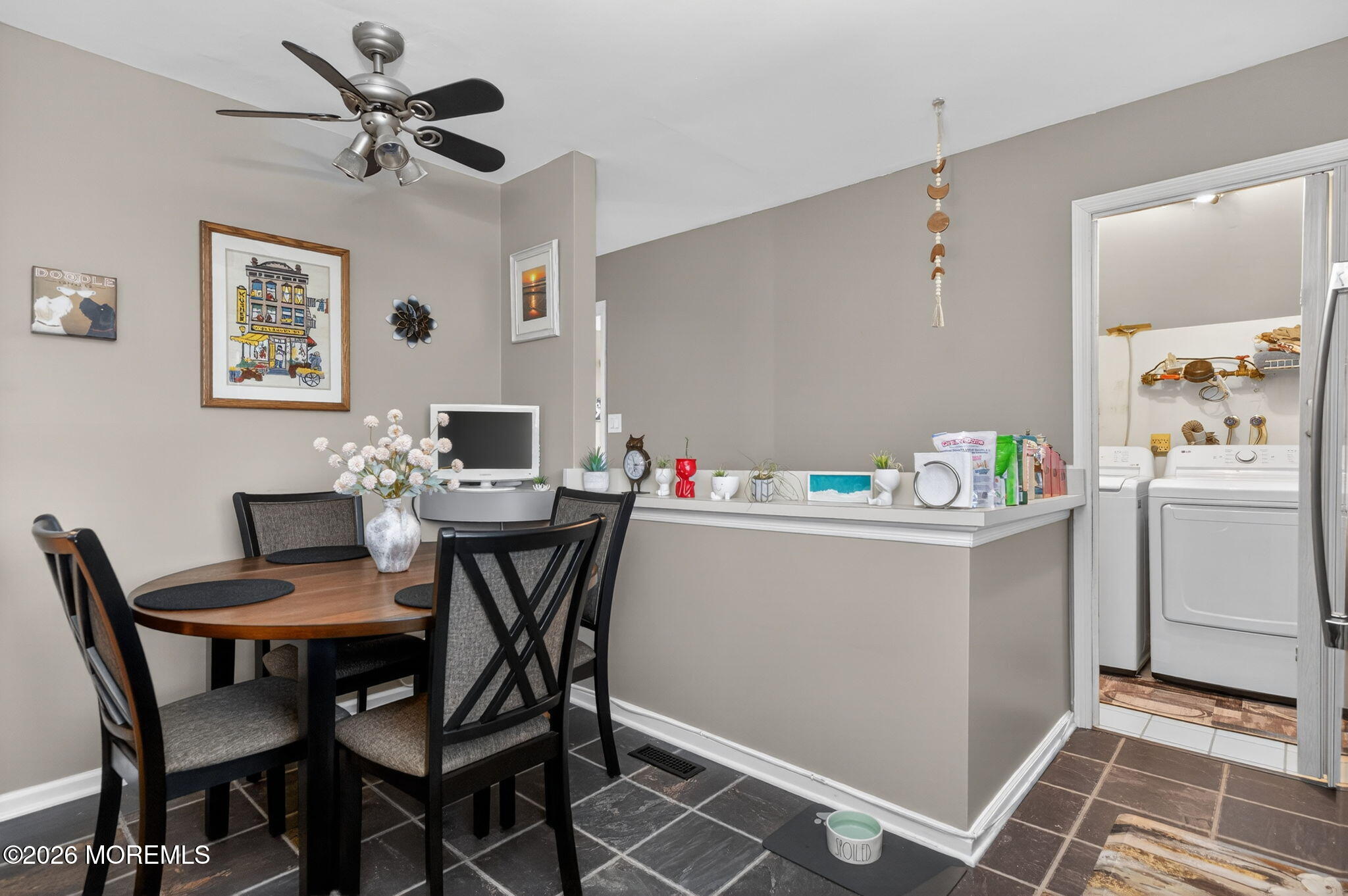 5 Scarborough Road, Unit D Monroe Township, NJ 08831 - Photo 9 of 28 a view of a dining room with furniture and wooden floor