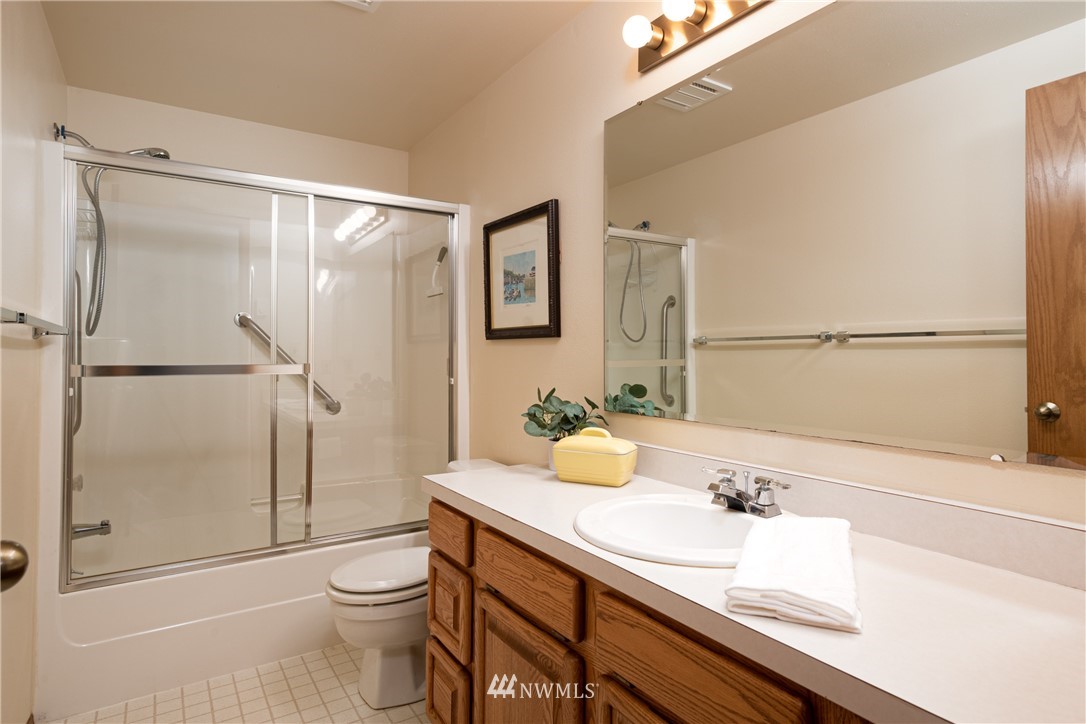 3115 Biz Point Road Anacortes, WA 98221 - Photo 20 of 39 a bathroom with a sink toilet and shower