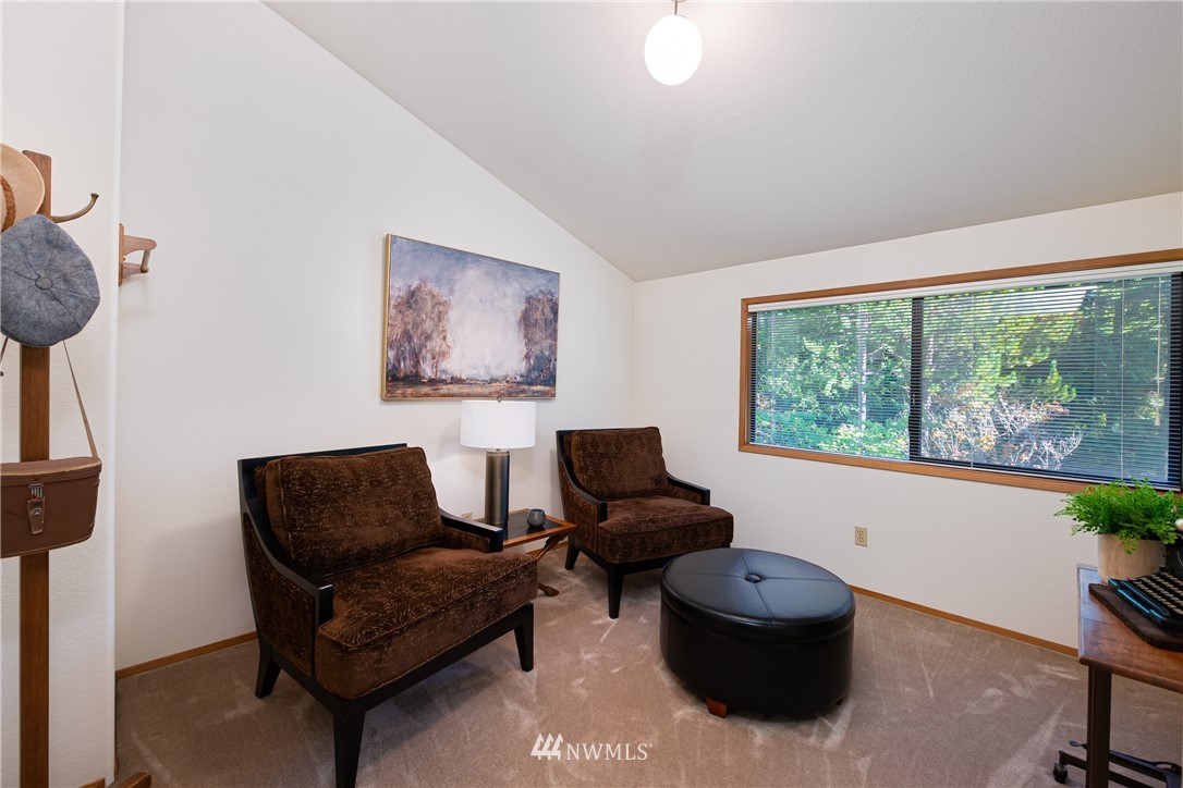3115 Biz Point Road Anacortes, WA 98221 - Photo 26 of 39 a living room with furniture and a window