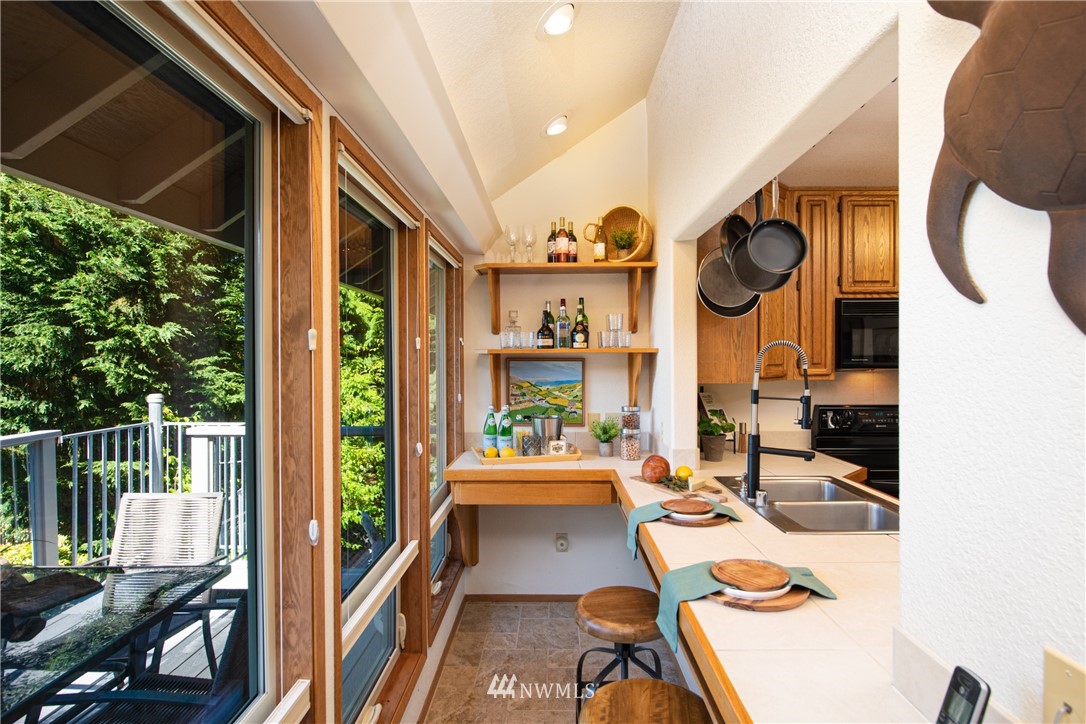 3115 Biz Point Road Anacortes, WA 98221 - Photo 31 of 39 a room with furniture and a large window