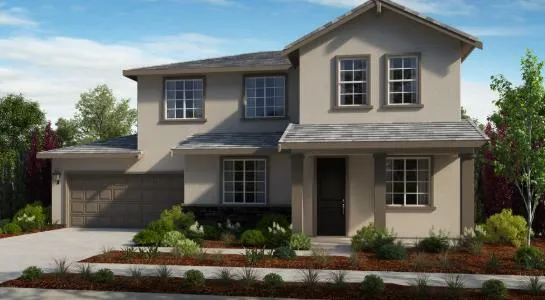 a front view of a house with a yard garage and outdoor seating