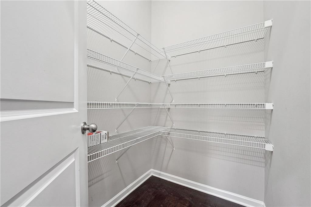 5590 Bright Cross Way Suwanee, GA 30024 - Photo 6 of 17 a view of an empty walk in closet