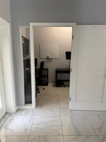 a view of workspace with chair