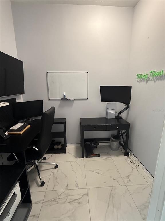 5690 Merlin Way St. Cloud, FL 34772 - Photo 13 of 46 a view of workspace with chair