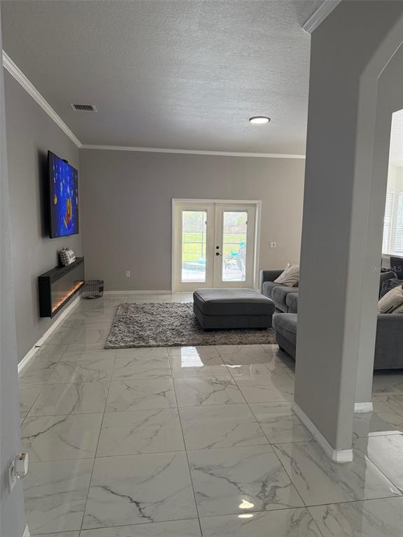 5690 Merlin Way St. Cloud, FL 34772 - Photo 3 of 46 a view of a livingroom with a furniture