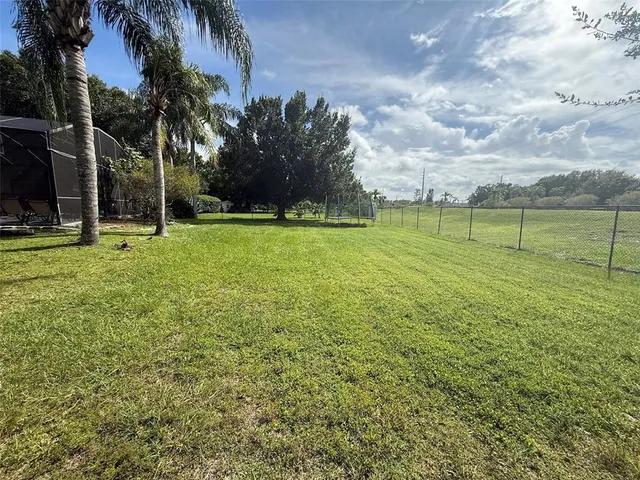 a view of a park with swings and slides