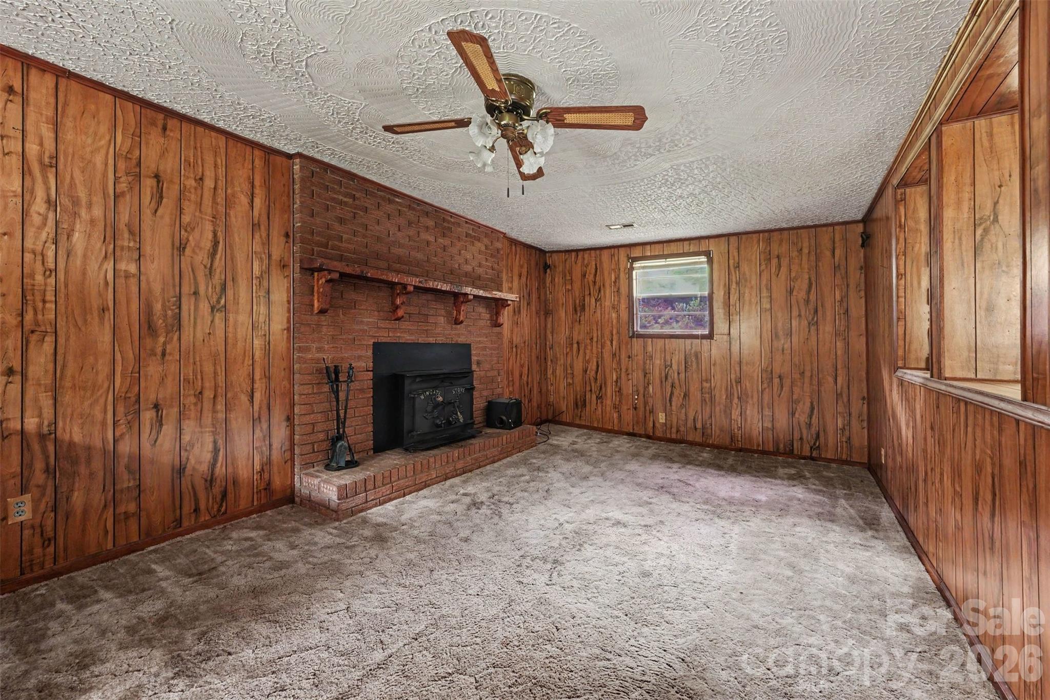 2871 Loviee Road Lincolnton, NC 28092 - Photo 4 of 14 a view of a livingroom with a fireplace