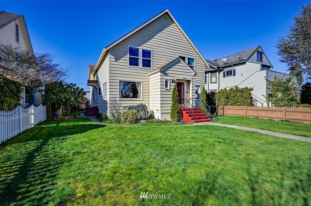 1908 Rucker Avenue Everett, WA 98201 - Photo 1 of 36 a front view of house with yard and green space
