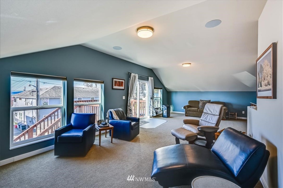 1908 Rucker Avenue Everett, WA 98201 - Photo 15 of 36 a living room with furniture and a flat screen tv