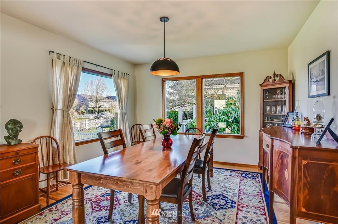 1908 Rucker Avenue Everett, WA 98201 - Photo 4 of 36 a view of a dining room with furniture window and outside view