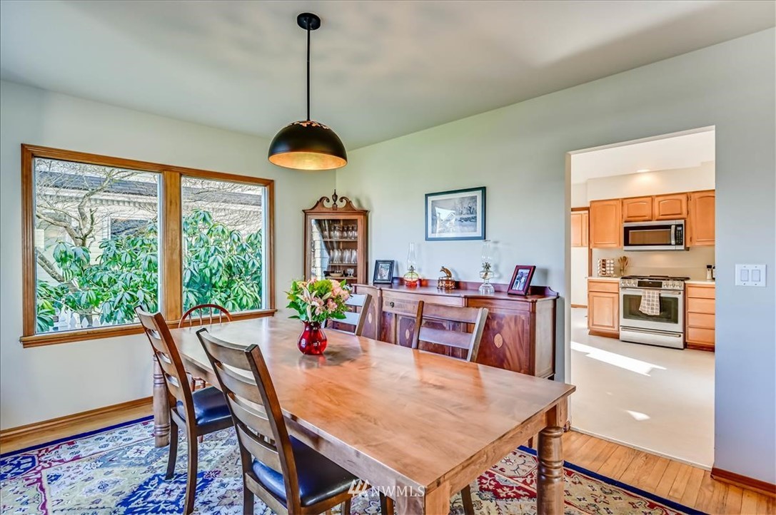 1908 Rucker Avenue Everett, WA 98201 - Photo 5 of 36 a dining room with furniture window wooden floor